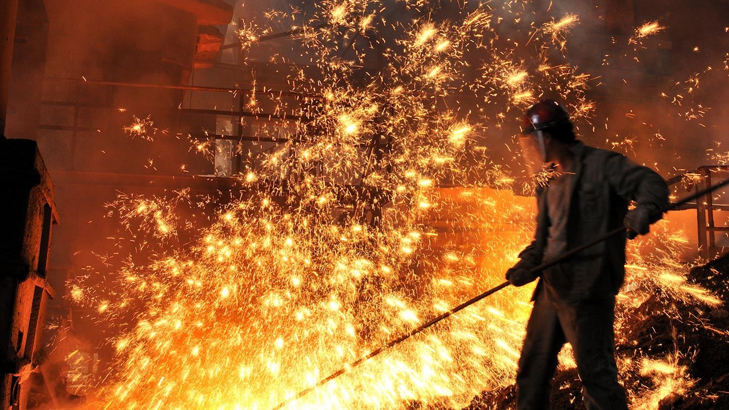 Man in steelmaking plant